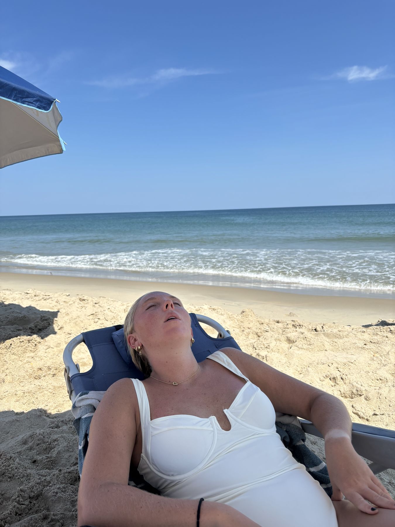 Lane asleep in her beach chair