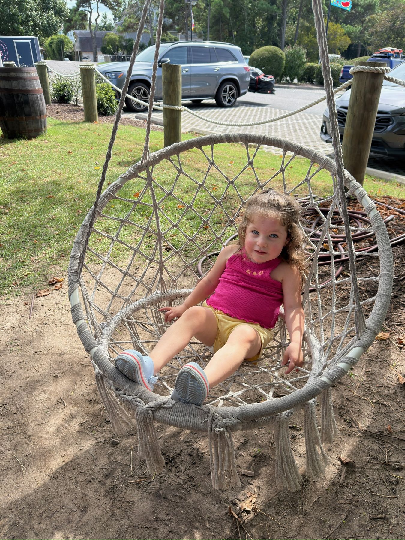 Niece in the hanging swing chair