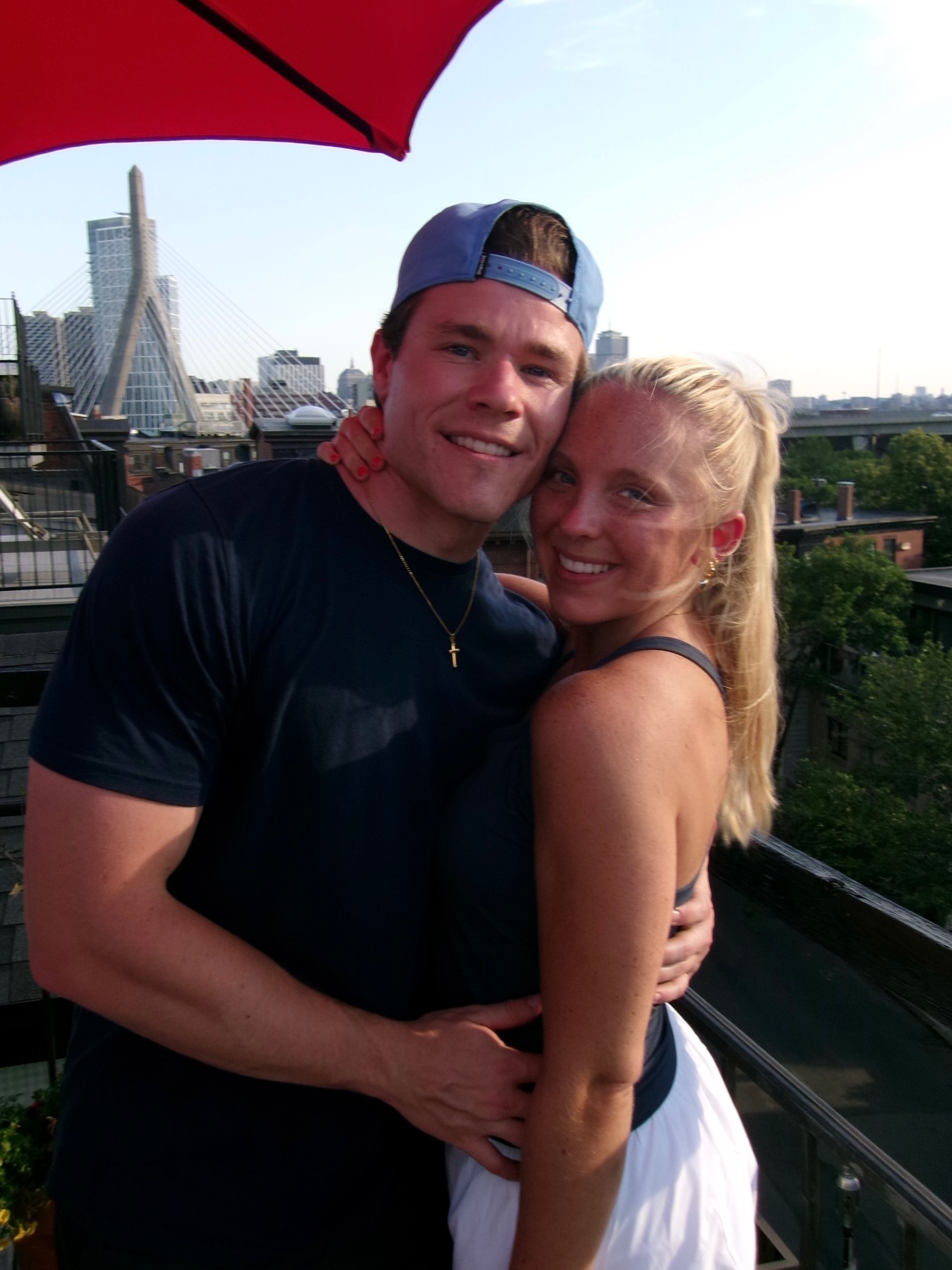 Lane and Aud on Daniel's rooftop with the Zakim Bridge