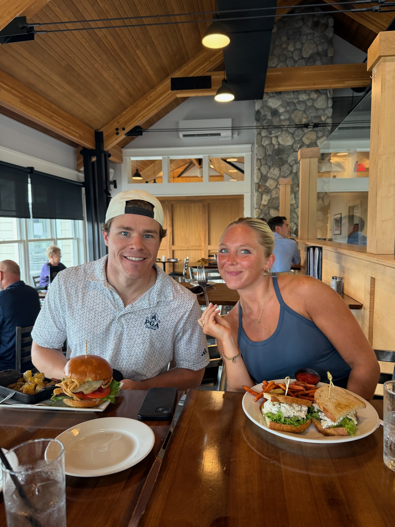 A and Lane with food at clubhouse