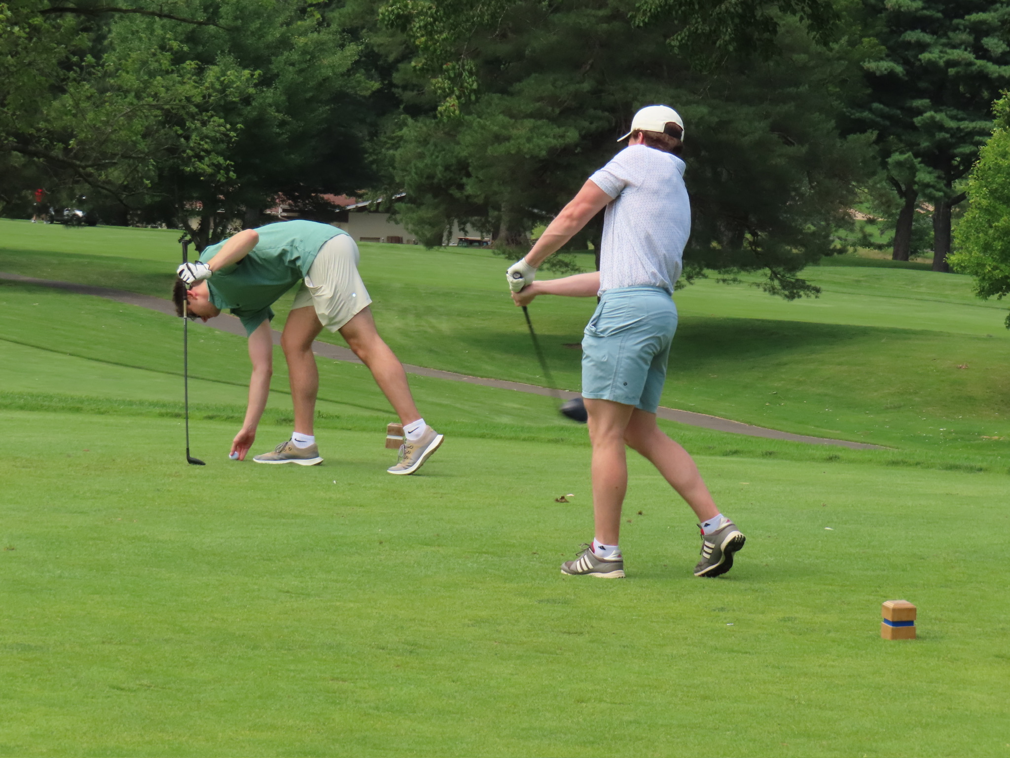 Both guys teeing off